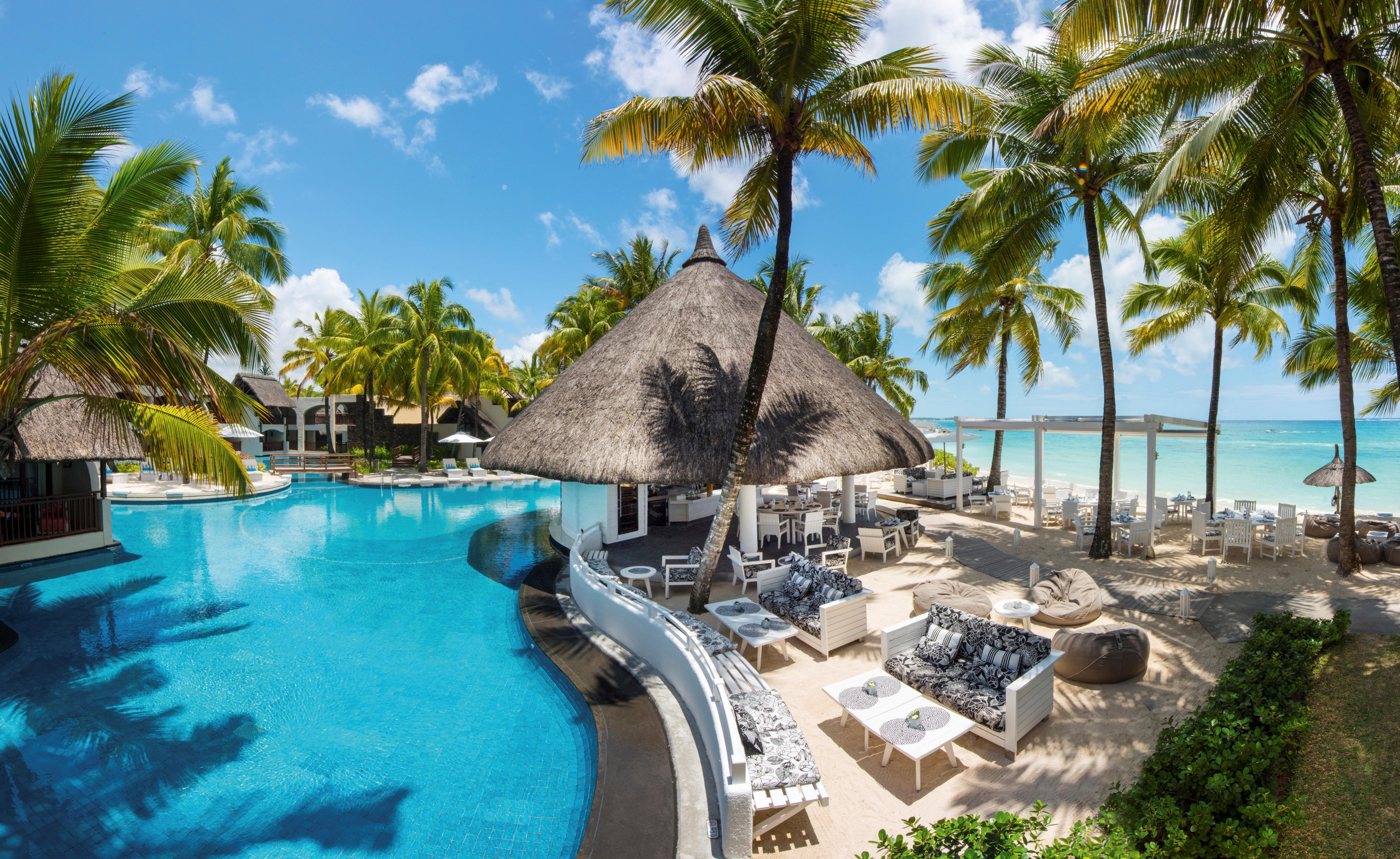 Constance Belle Mare Plage Kültér fotó The swimming pool at the resort