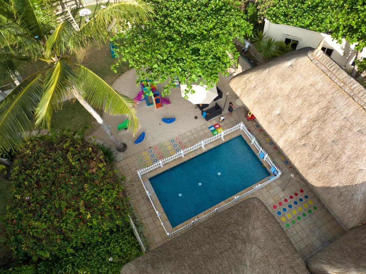 Constance Belle Mare Plage Kültér fotó Swimming pool at the school